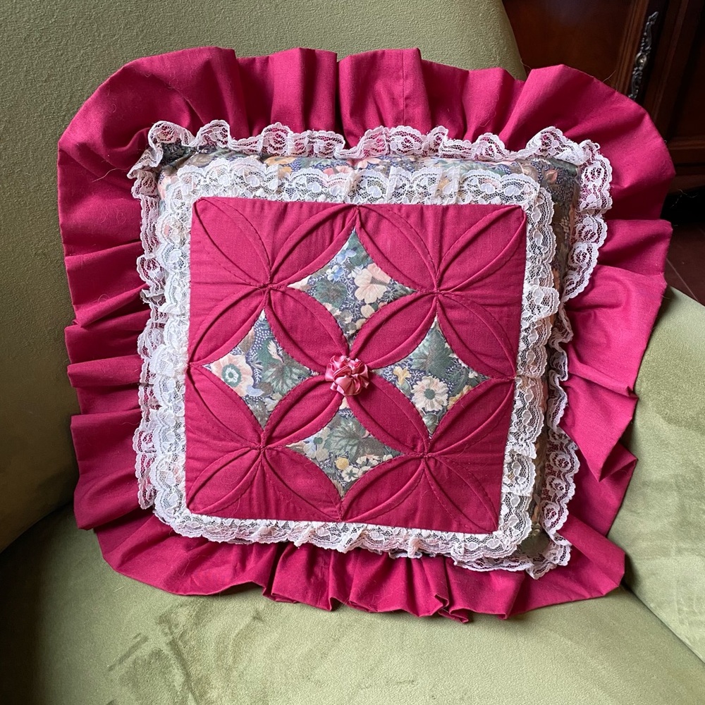 Hand crafted patchwork and smocked accent pillow.